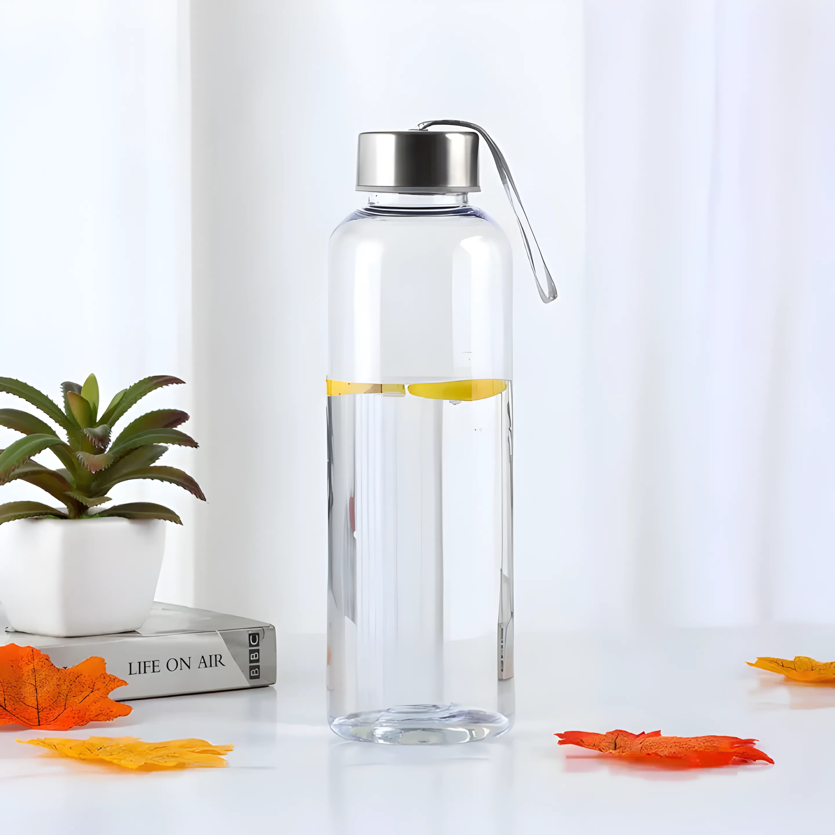 Elegant transparent glass water bottle with modern portable design for girls and students