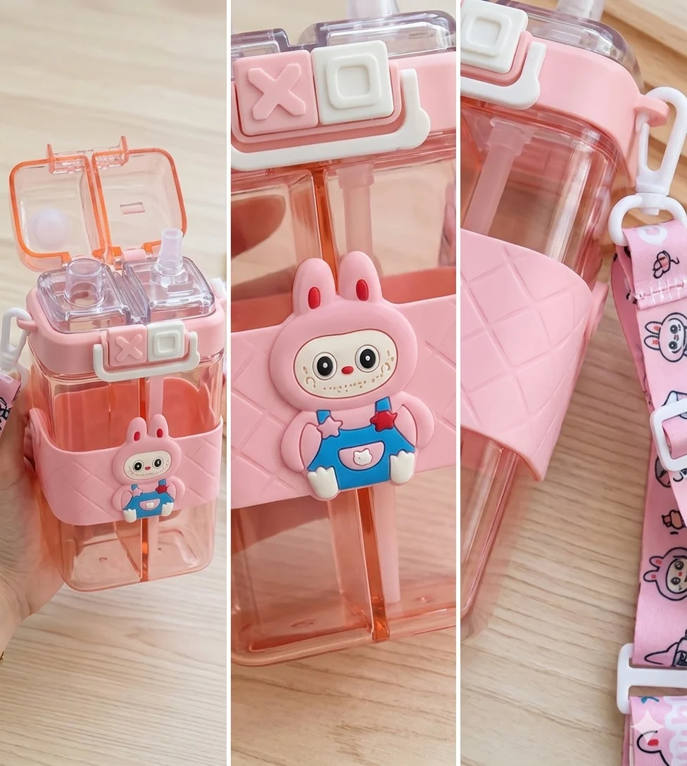 “Pink bunny-themed dual-chamber kids water bottle, made of translucent plastic with fun cartoon motif, white latch, and matching strap, easy to carry and spill-proof.”