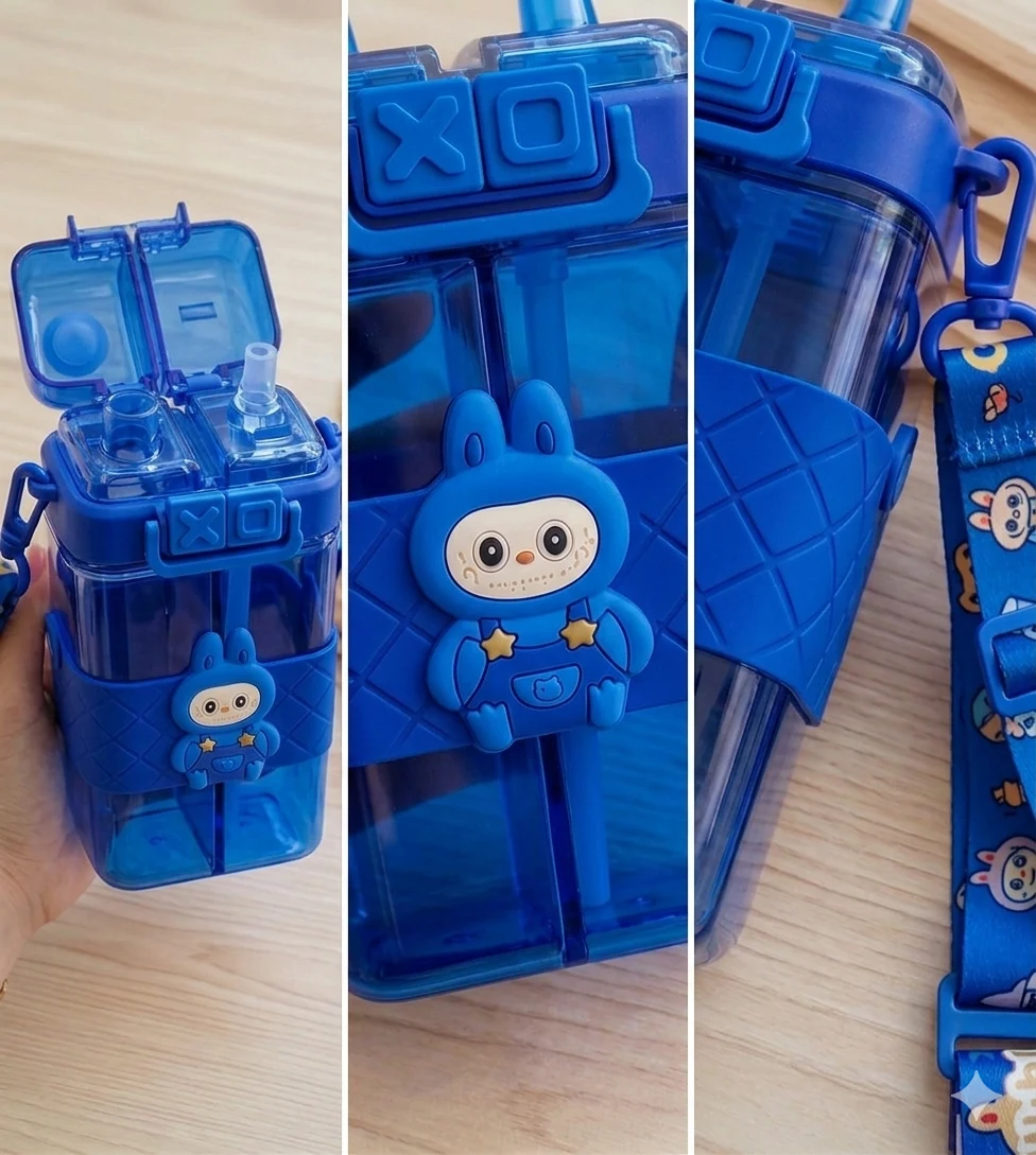 “Blue bunny-themed dual-chamber water bottle for kids, made of translucent plastic with cartoon design, white latch, and colorful strap, ideal for school and outdoor activities.”